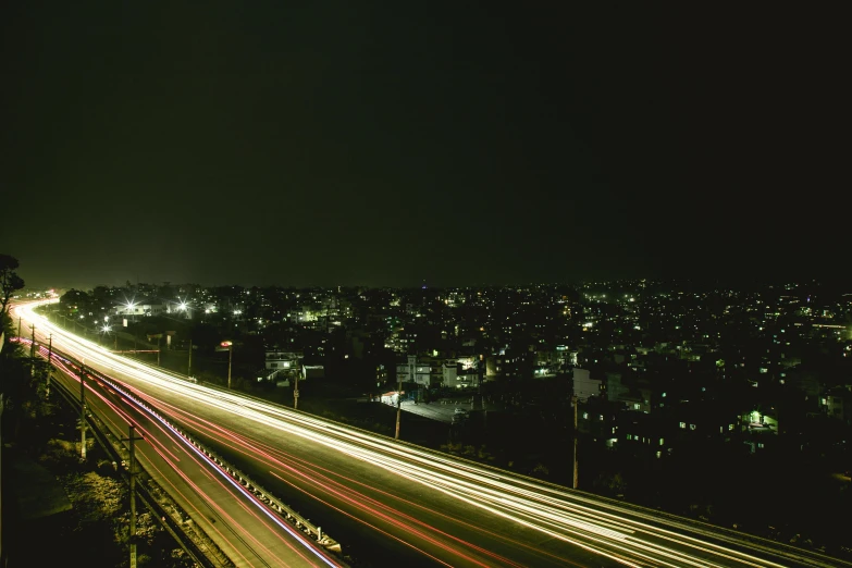 a long exposure photo of a city at night, unsplash, visual art, indore, fuji superia, detailed medium format photo, highways