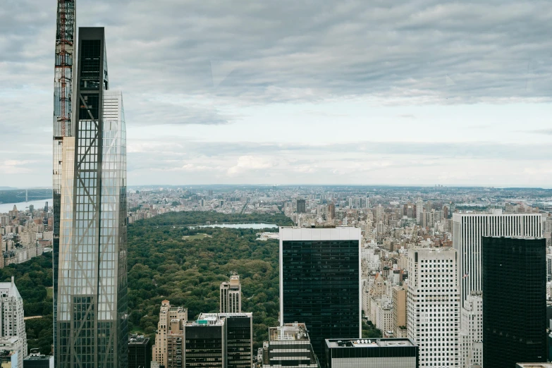 a view of a city from the top of a building, inspired by Thomas Struth, pexels contest winner, central park, view(full body + zoomed out), ignant, unsplash 4k