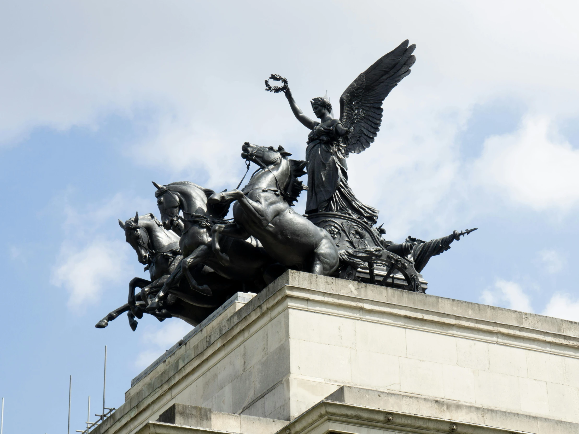 a statue of an angel on top of a building, cavalry, queen victoria, halo over her head, hercules brabazon