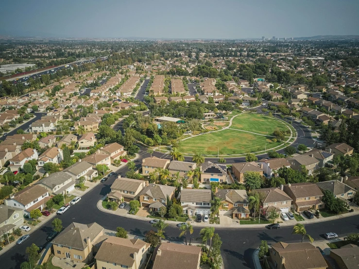 a bird's eye view of a residential area, by Ryan Pancoast, wide angle landscape photography, high res 8k, album, carson ellis