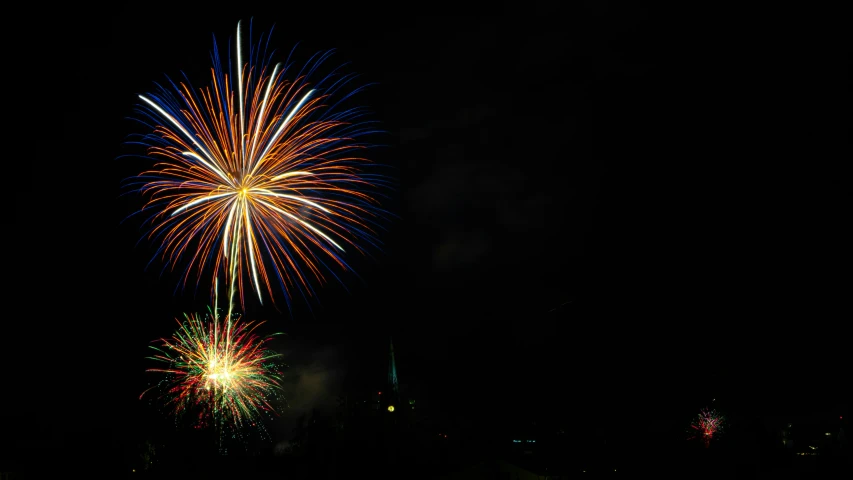 a fireworks is lit up in the night sky, by Jan Rustem, square, 15081959 21121991 01012000 4k, community celebration, plain background