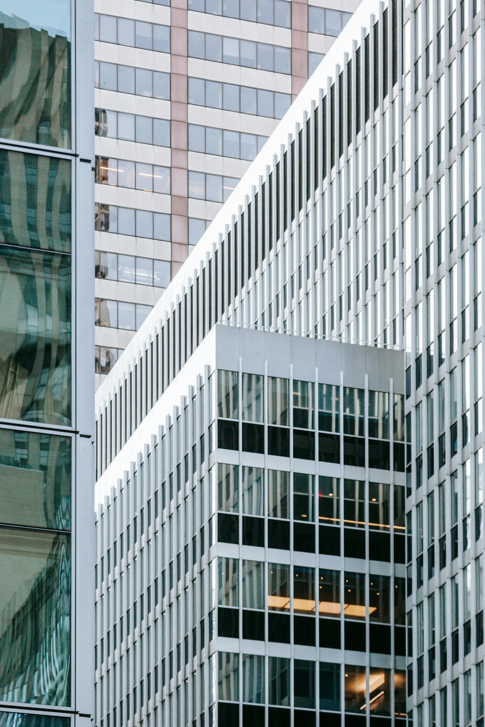 a clock that is on the side of a building, inspired by David Chipperfield, pexels contest winner, modernism, steel window mullions, photograph of san francisco, ignant, detail structure