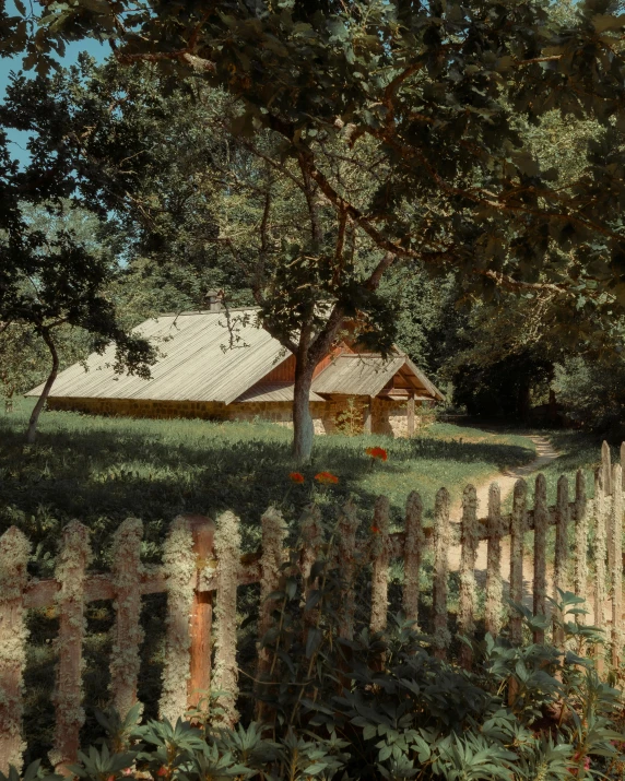 a painting of a fence with a house in the background, inspired by Isaac Levitan, pexels contest winner, vintage photo, hansel and gretel, andrey tarkovsky, background image