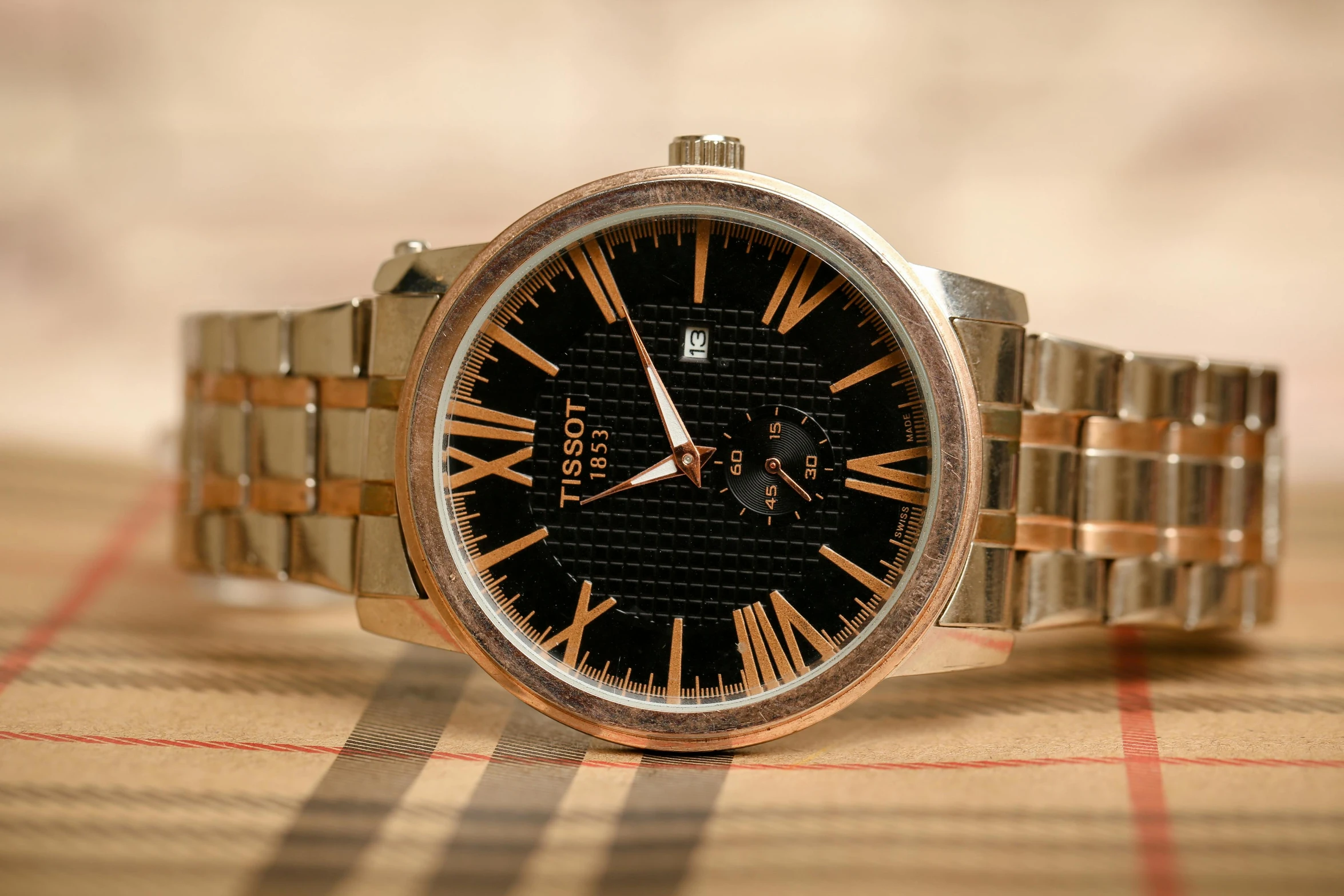 a close up of a watch on a table, pexels contest winner, renaissance, brown and gold, thumbnail, triumph, rose gold