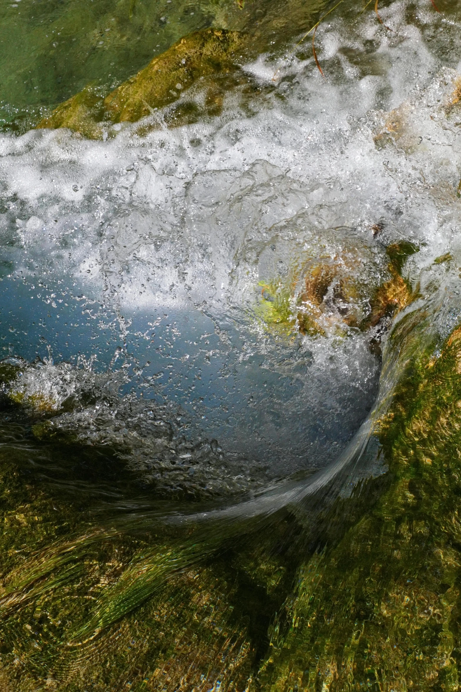 a man riding a wave on top of a surfboard, a picture, by Mirko Rački, pexels contest winner, renaissance, gentle sparkling forest stream, macro shot, bubbling cauldron!, made of water