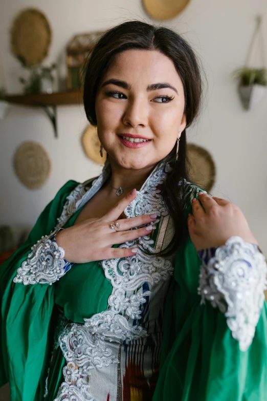 a woman in a green dress posing for a picture, trending on pexels, hurufiyya, kazakh empress, plus size, 1 6 years old, 15081959 21121991 01012000 4k