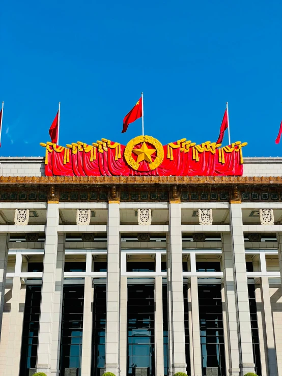 a building with a lot of flags on top of it, pexels contest winner, socialist realism, chinese president, 2 5 6 x 2 5 6 pixels, 🚿🗝📝