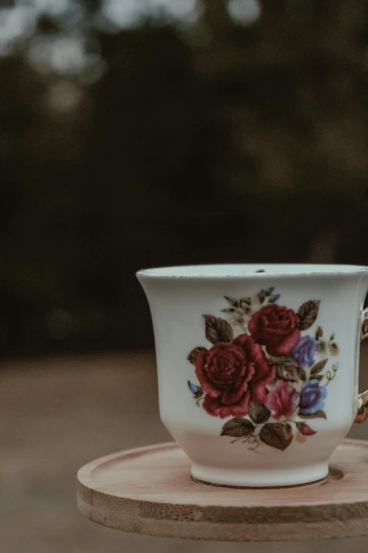 a close up of a coffee cup on a saucer, cottagecore hippie, aged 2 5, high quality product image”, abundantly detailed