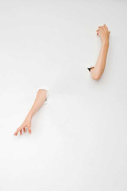 two hands reaching out of a hole in a wall, an album cover, inspired by Cornelia Parker, conceptual art, white porcelain skin, lois greenfield, 15081959 21121991 01012000 4k, digitally enhanced