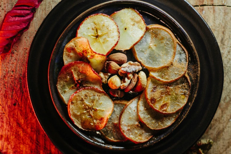 a close up of a plate of food on a table, an album cover, by Julia Pishtar, unsplash, renaissance, walnuts, potato, 15081959 21121991 01012000 4k, chile