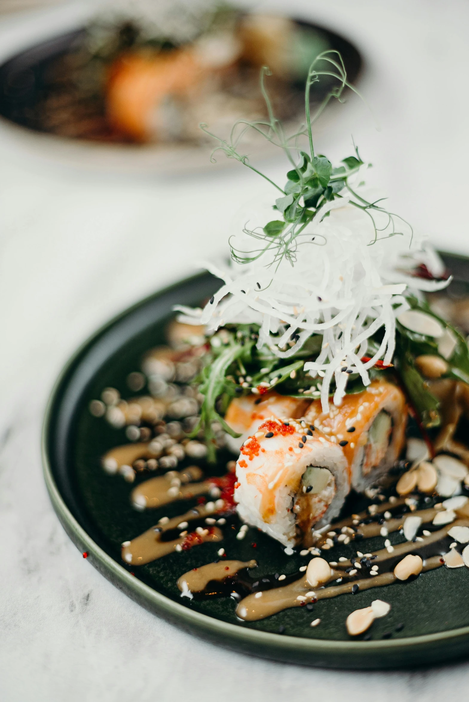 a close up of a plate of food on a table, inspired by Maki Haku, unsplash, stunning details, trendy food, sparkling, angle view