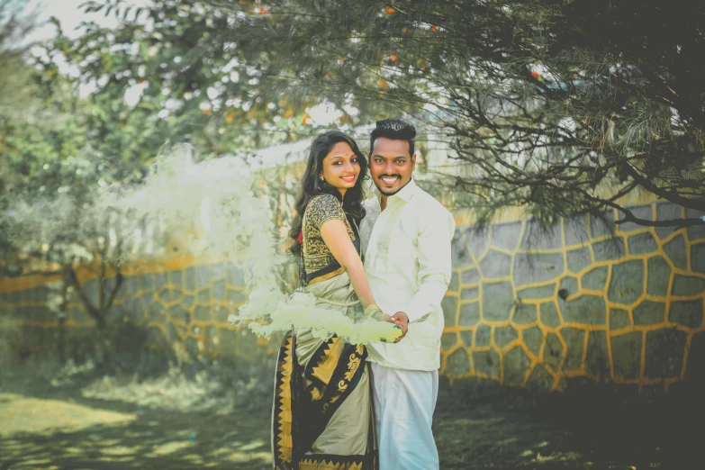 a man and a woman standing next to each other, a picture, by Thota Vaikuntham, pexels contest winner, green colored theme, square, happy couple, rustic