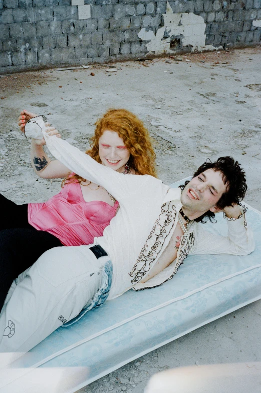 a couple of people laying on top of a mattress, an album cover, renaissance, pale skin!, paradise city, with freckles, sid