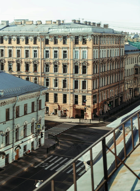 a view of a city from the top of a building, inspired by Vasily Surikov, pexels contest winner, art nouveau, square, highly realistic. live cam, фото девушка курит, street corner