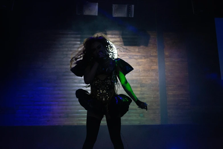 a woman standing on top of a stage holding a microphone, nightclub dancing inspired, beyonce, square, taken with sony alpha 9