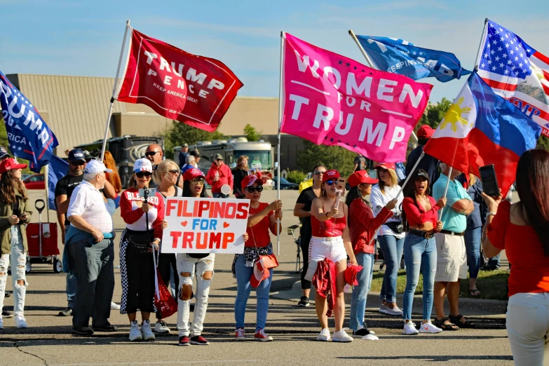 a group of people holding signs and flags, by Bernardino Mei, reddit, donald trump, crimson themed, graphic print, former