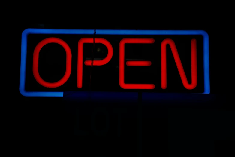 an open sign lit up in the dark, blue and red two - tone, thumbnail, open top, low iso