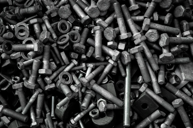 a pile of nuts and bolts in black and white, an album cover, by Kazimierz Wojniakowski, unsplash, copper oxide material, 15081959 21121991 01012000 4k, mining scrap metal, high quality wallpaper