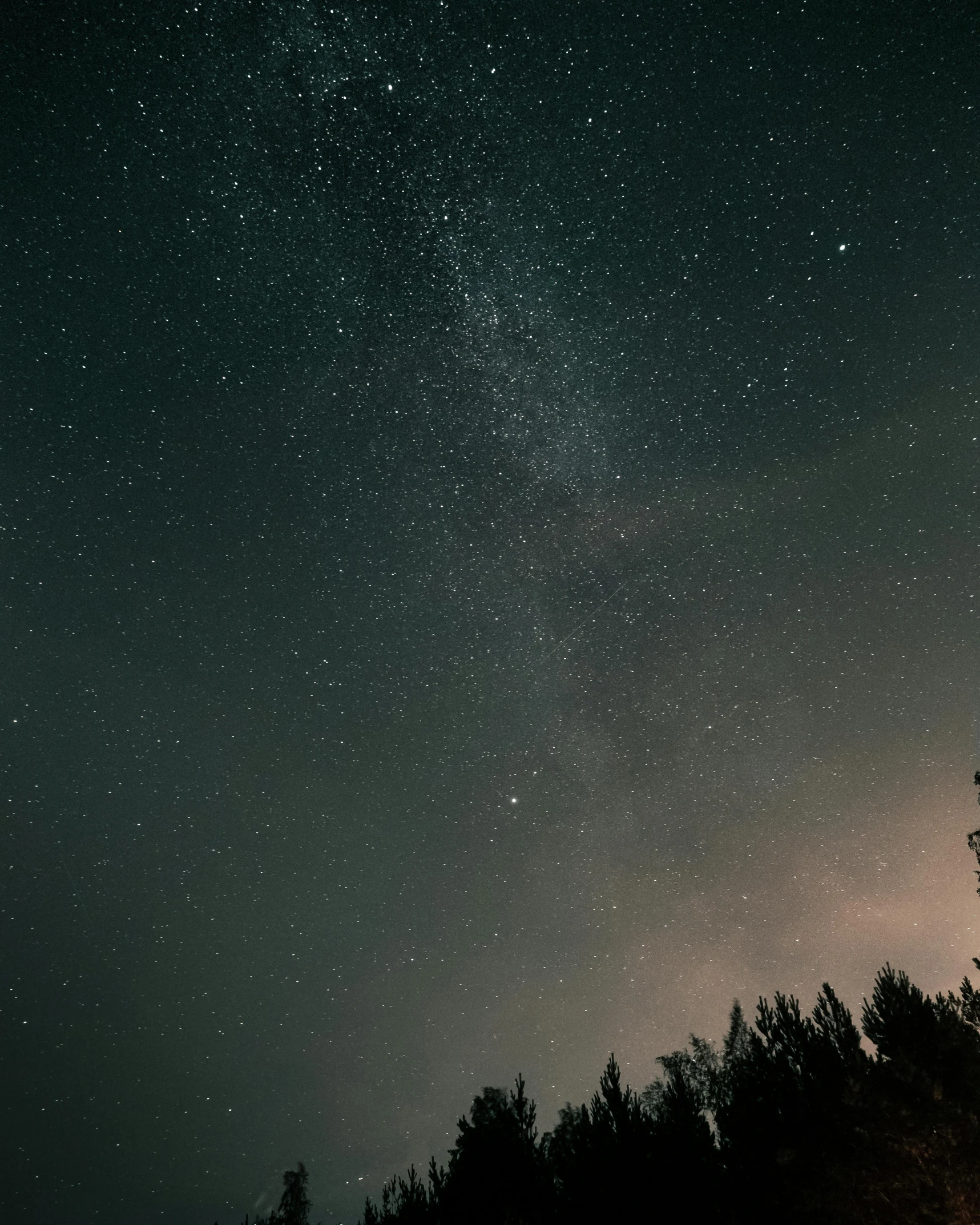 a group of people sitting around a campfire under the stars, by Adam Marczyński, trending on unsplash, light and space, tree in a galaxy made of stars, panorama view of the sky, with thunderstorms, pictured from the shoulders up