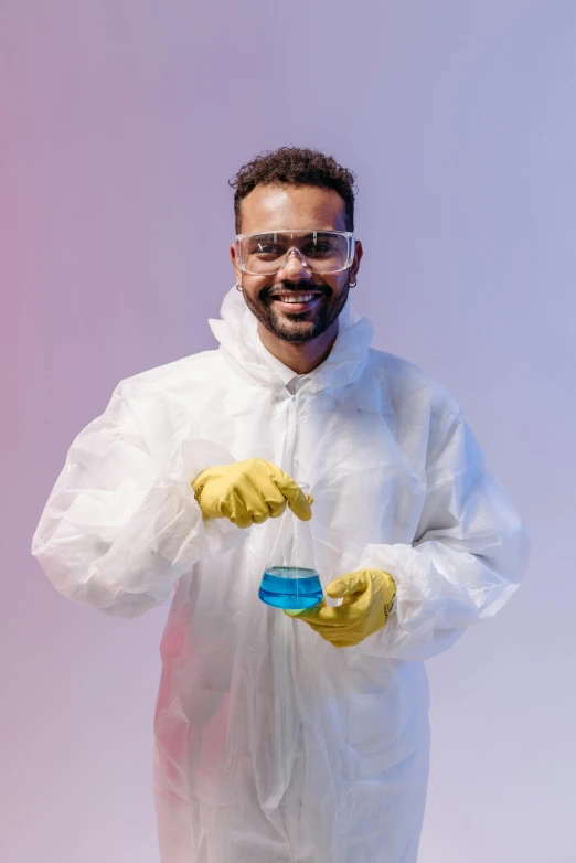 a man in a lab coat holding a blue substance, an album cover, pexels contest winner, afro tech, yellow latex gloves, looking happy, vapor wave