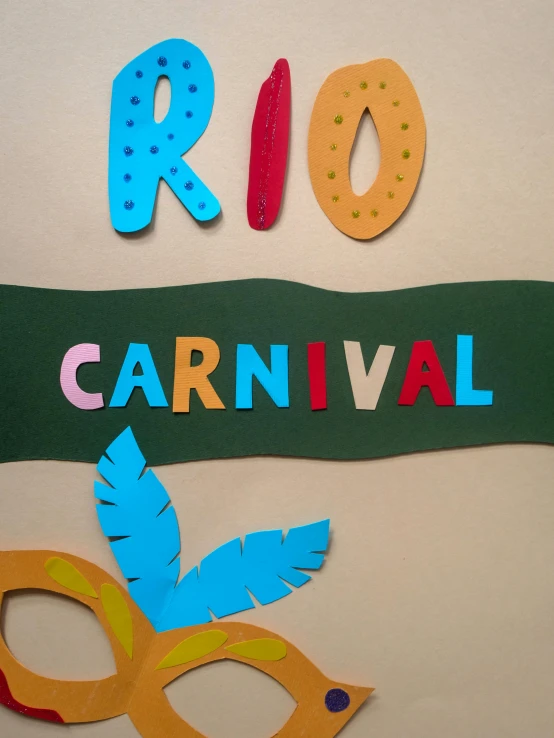 a picture of a sign that says rio carnival, by Rhea Carmi, trending on unsplash, made of felt and cloth and beads, kirigami, casual game, kid