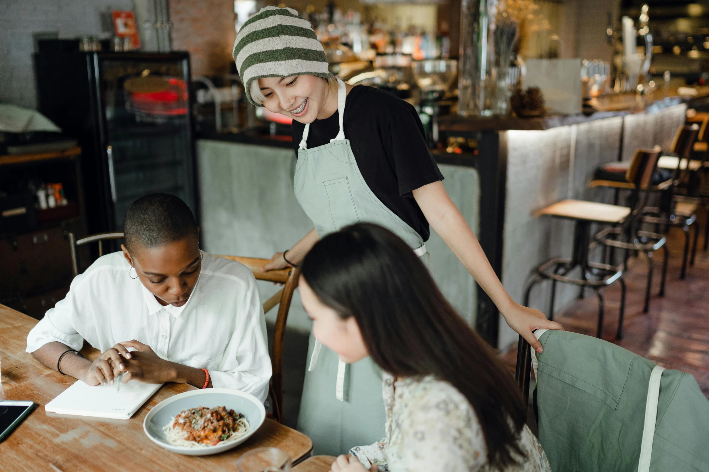 a couple of people that are sitting at a table, pexels contest winner, ( waitress ) girl, plating, helpful, thumbnail