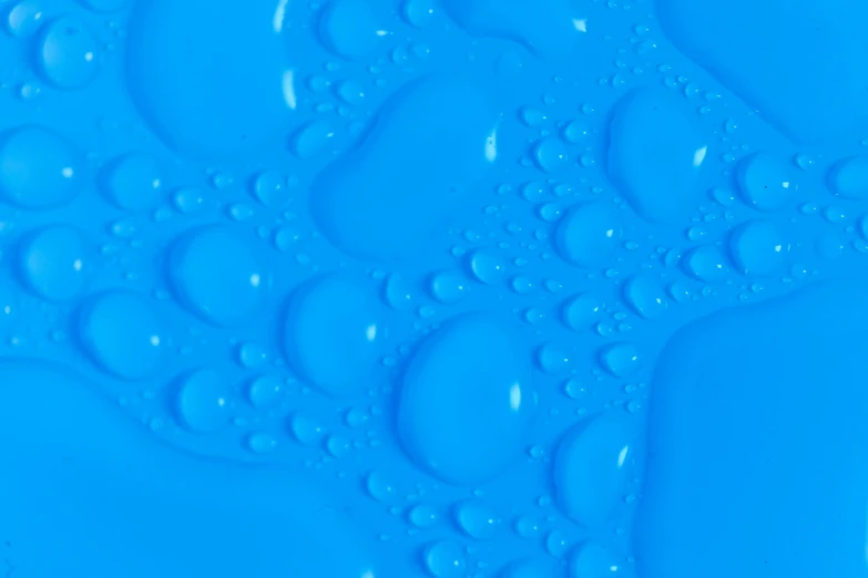 a close up of water bubbles on a blue surface, inspired by Yves Klein, pexels contest winner, plasticien, 3dcoat h 648, light blue, plastic ceramic material, detailed product image