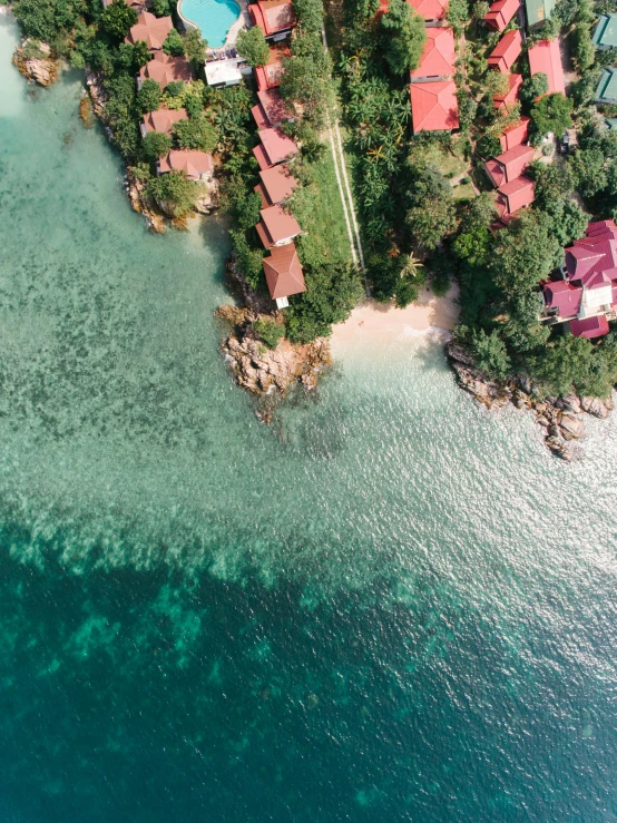 an aerial view of a resort in the middle of the ocean, pexels contest winner, thumbnail, thailand, cinematic close shot, shoreline