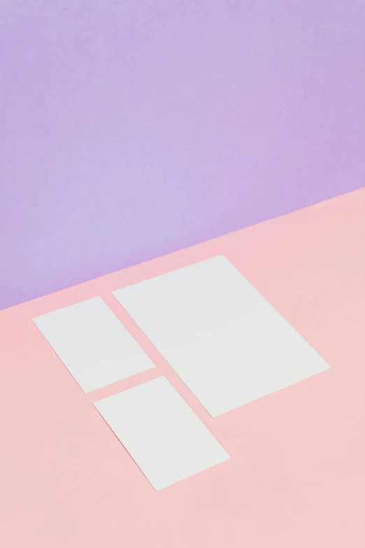 a laptop computer sitting on top of a pink and purple surface, by Harvey Quaytman, postminimalism, card template, ilustration, sheet paper, overview