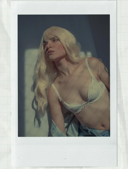 a polaroid picture of a woman with long blonde hair, inspired by Elsa Bleda, renaissance, posing together in bra, albino skin, smooth translucent white skin, janice sung