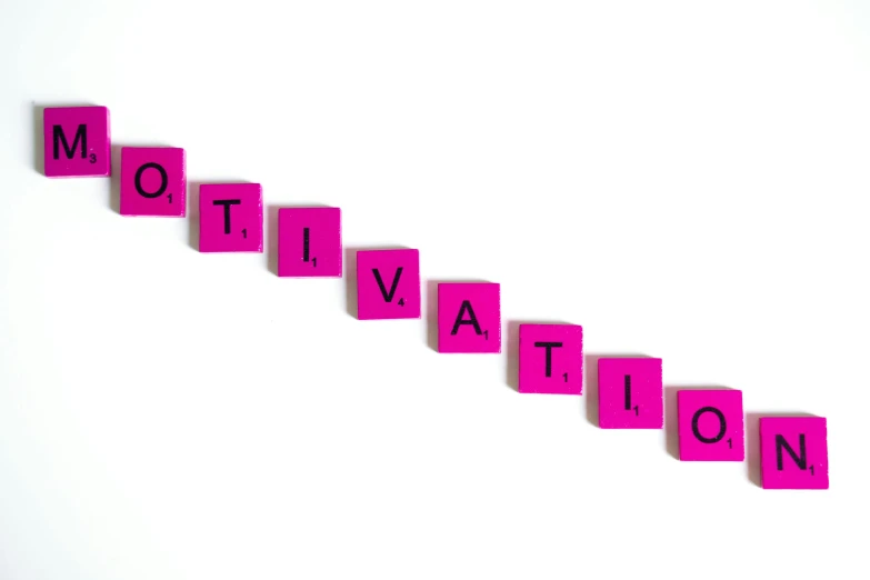 pink blocks spelling motivation on a white background, trending on pixabay, background image, optimism, innovative, sports photo