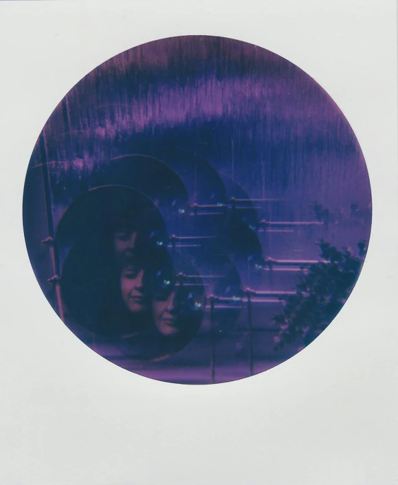 a polaroid picture of a woman with an umbrella, inspired by Elsa Bleda, unsplash, conceptual art, ((purple)), round format, portrait of two people, in a spaceship