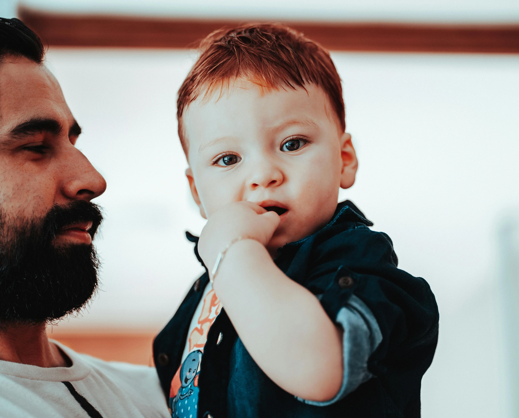 a man holding a little boy wearing a tie, pexels contest winner, red beard, avatar image, profile image, charli bowater and artgeem