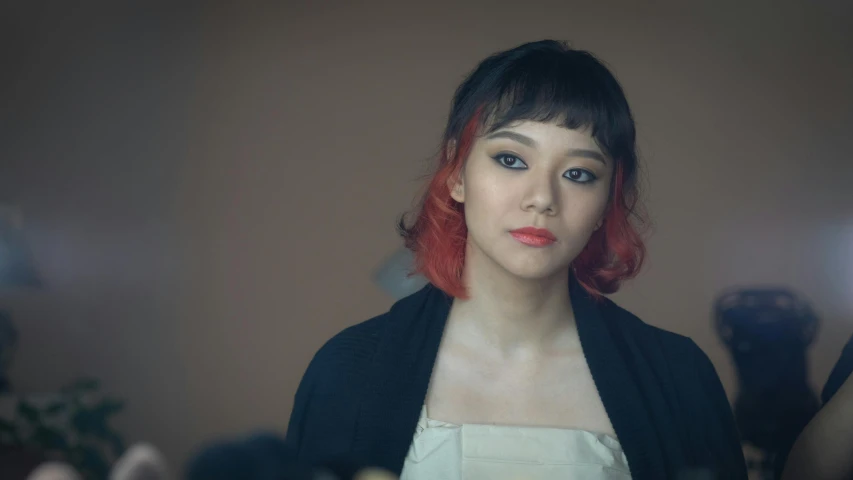 a woman with red hair standing in front of a mirror, a character portrait, inspired by Li Fangying, trending on pexels, hyperrealism, still from a music video, gongbi, medium format. soft light, with short hair