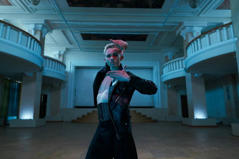 a man that is standing in a room, an album cover, by Emma Andijewska, unsplash, anya taylor - joy vampire queen, performing a music video, battle pose, vergil