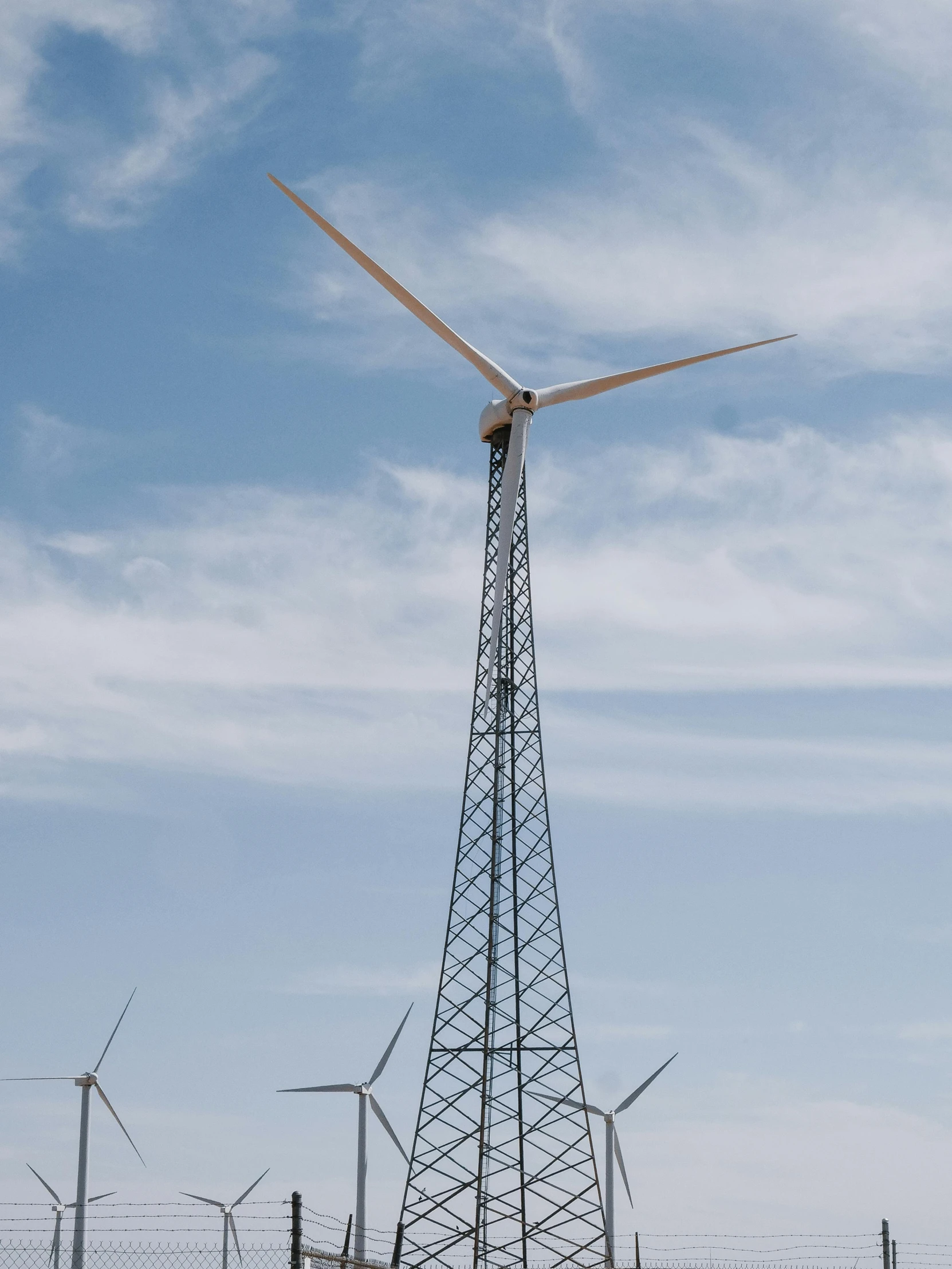 a wind turbine sitting in the middle of a field, by Jacob Burck, eagles, no cropping, desert wind, profile image