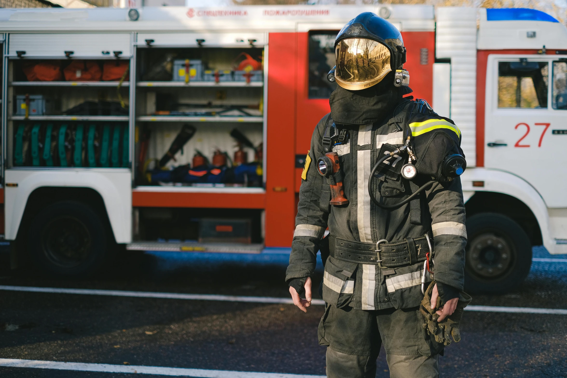 a firefighter standing in front of a fire truck, a photo, by Adam Marczyński, renaissance, space suit with a modern helmet, 15081959 21121991 01012000 4k, alessio albi, fire reak real life