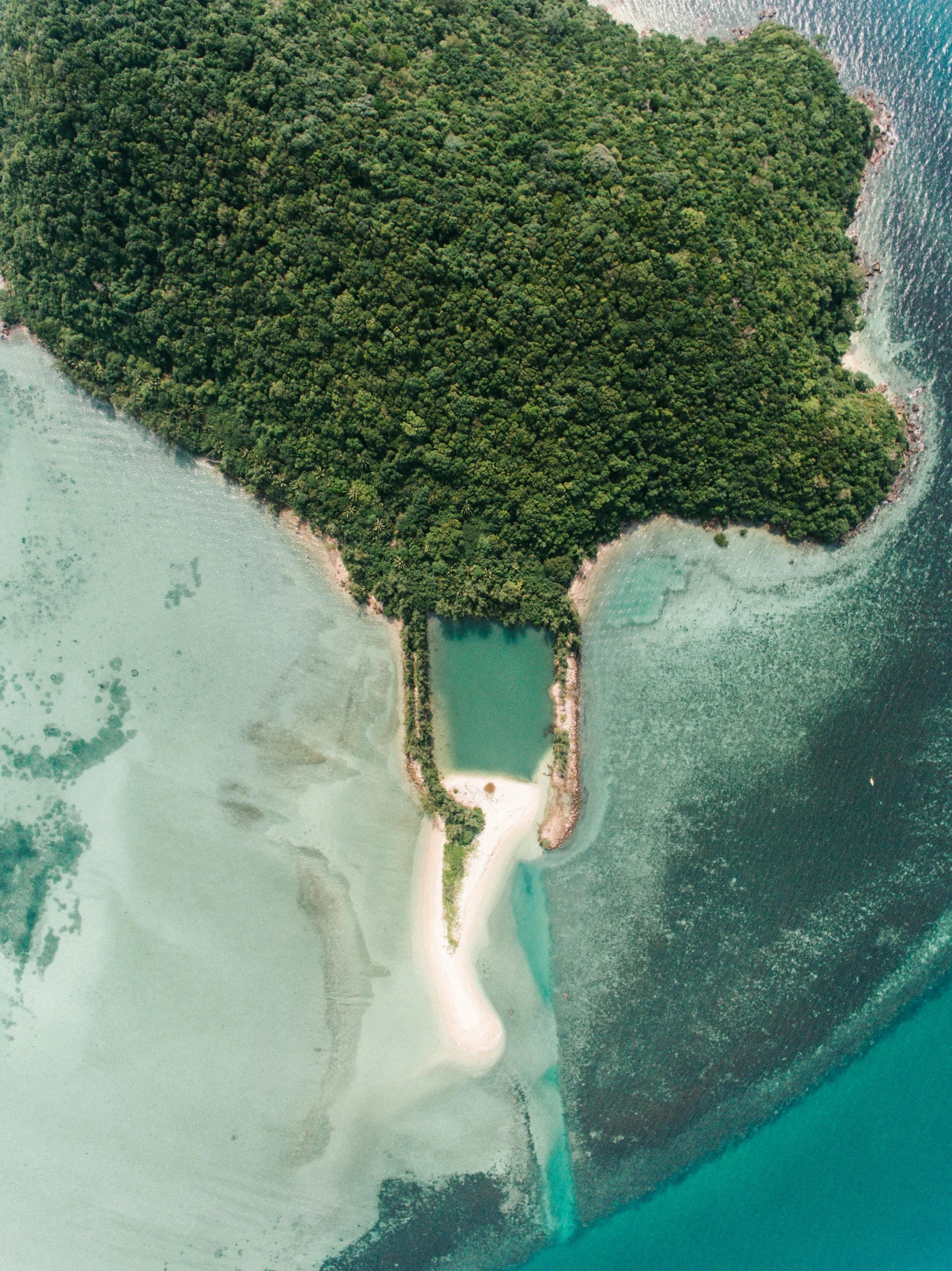 an aerial view of a small island in the middle of the ocean, a screenshot, pexels contest winner, abel tasman, thumbnail, philippines, conde nast traveler photo