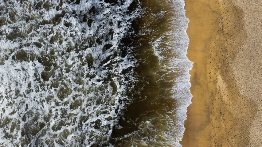 a person riding a surfboard on top of a sandy beach, inspired by Andreas Gursky, unsplash contest winner, renaissance, rushing water, seen from straight above, ochre, deeply hyperdetailed