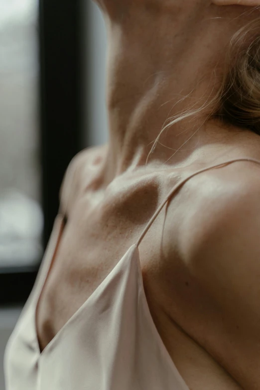 a close up of a woman wearing a white dress, chest hair, hanging veins, 4 k film still, arched back