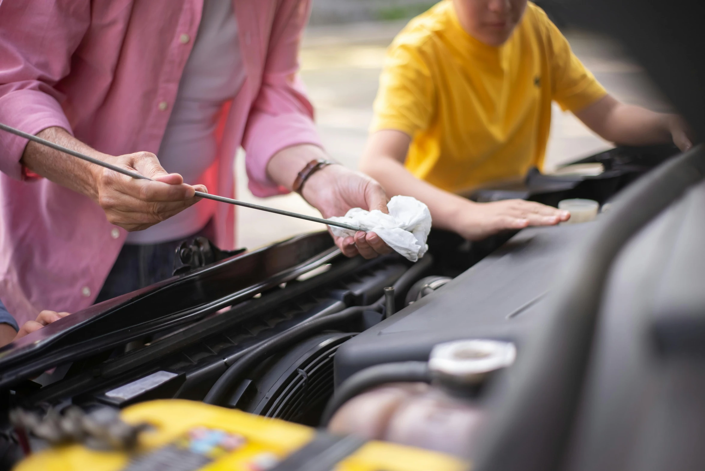 a couple of men working on a car engine, a portrait, shutterstock, a brightly coloured, square, teenage boy, diagnostics