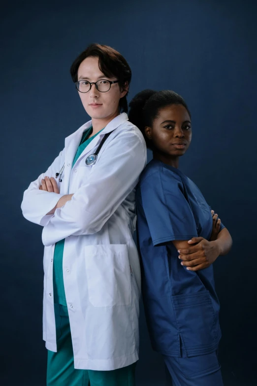 two female doctors standing next to each other, a portrait, by Adam Marczyński, mix of ethnicities and genders, janice sung, stacked image, high quality image