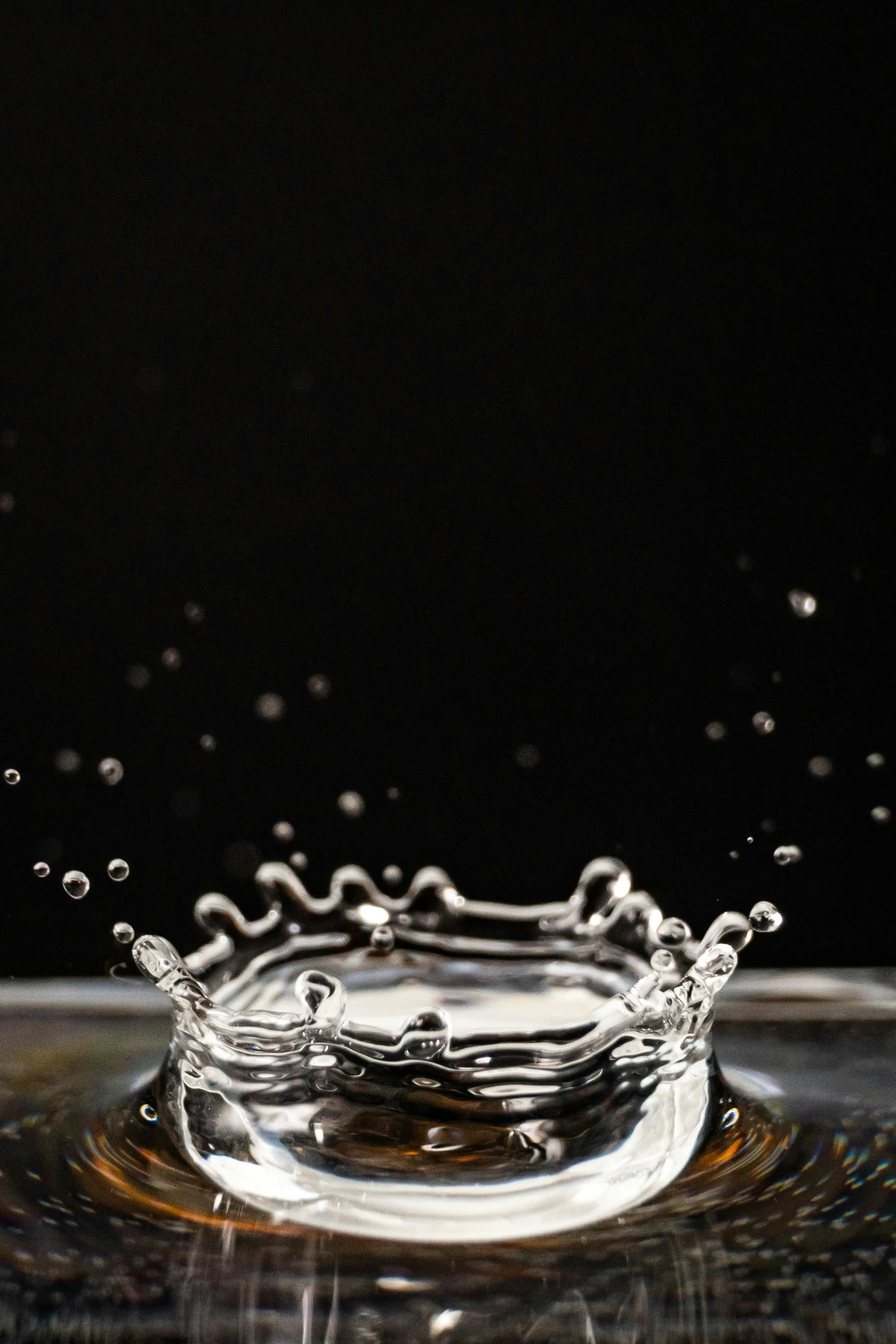 a drop of water falling into a glass, by Daniel Seghers, pexels, renaissance, resembling a crown, stainless steal, realflow, waist - shot