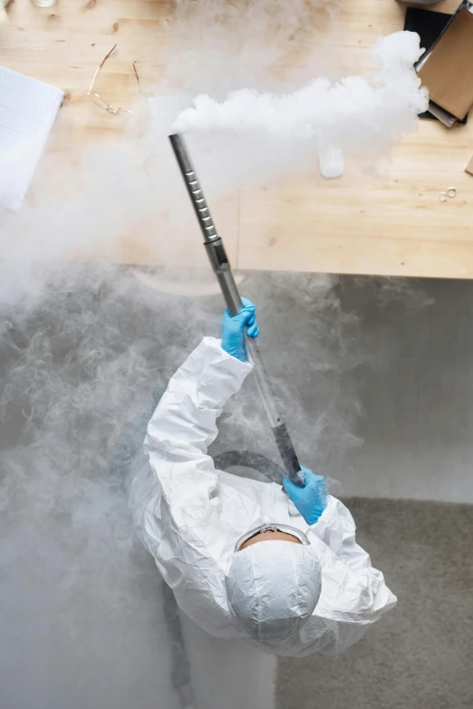 a person in a white suit spraying something with a mop, cryogenic pods, thumbnail, smoky laboratory, profile image