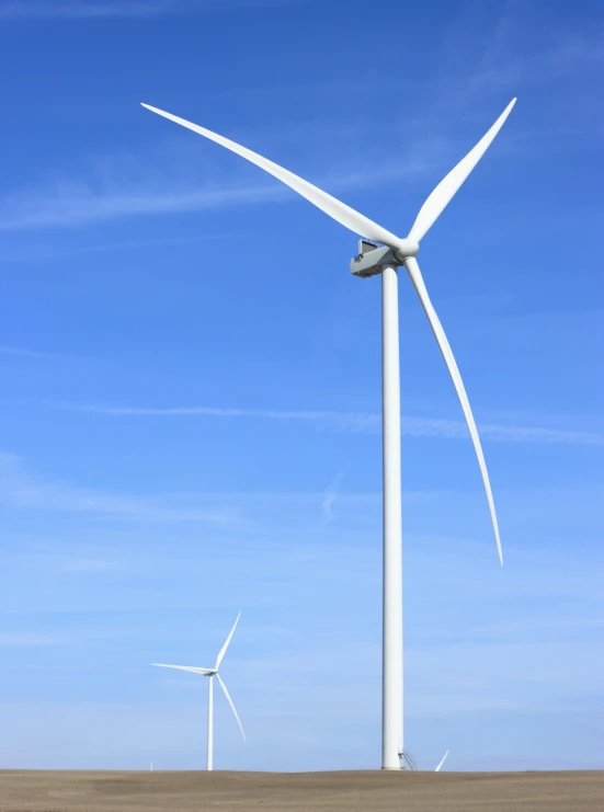 a group of wind turbines in a field, by Carey Morris, pexels contest winner, 2 5 6 x 2 5 6 pixels, blue sky, medium closeup, santiago calatrava