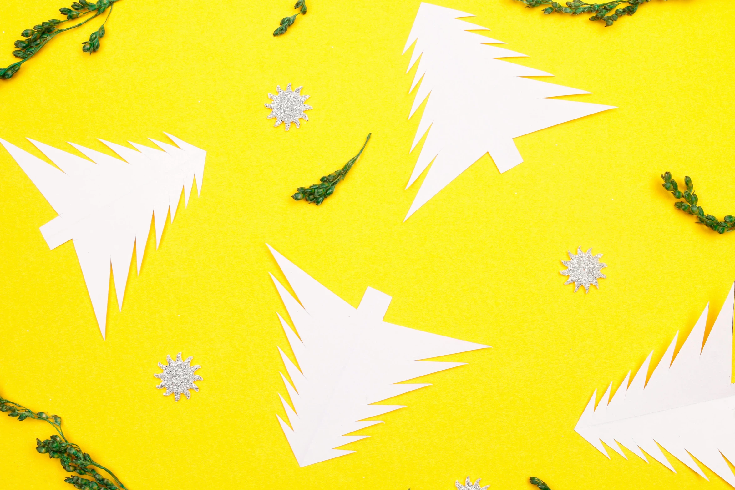 a yellow background with white christmas trees and snowflakes, by Julia Pishtar, pexels contest winner, paper decoration, background image, minimalistic composition, cut