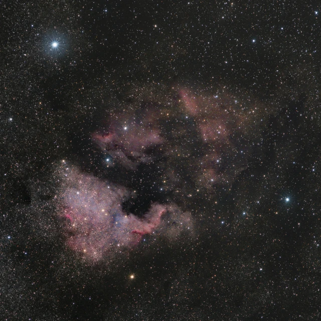 a star filled sky filled with lots of stars, a portrait, by Reuben Tam, smoke pit nebulas, 200mm wide shot, colour corrected, cloud in the shape of a dragon