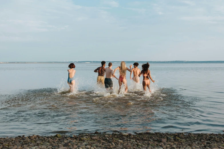 a group of people that are standing in the water, people running away, summer vibes, upon a peak in darien, unsplash transparent