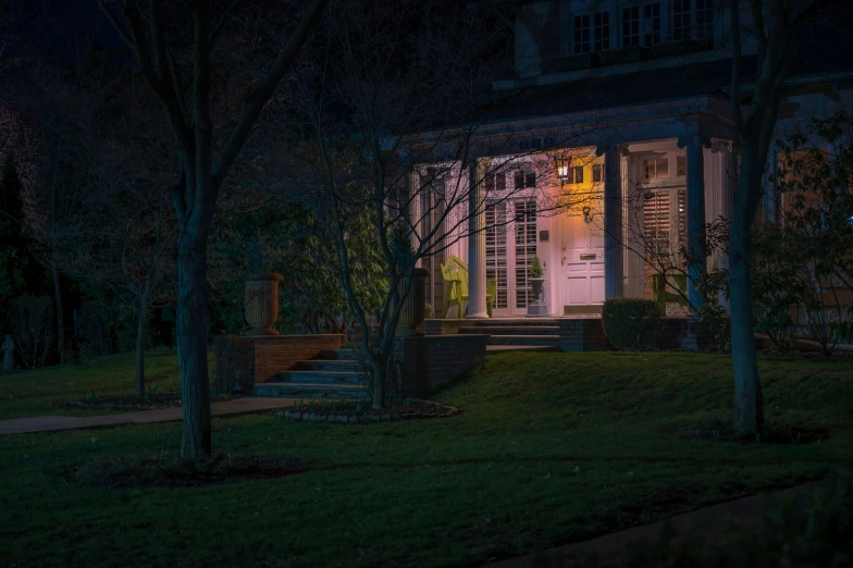 a house that is lit up at night, a colorized photo, inspired by Gregory Crewdson, pexels contest winner, lanterns on the porch, vaporwave mansion, dramatic warm morning light, shot on sony a 7 iii