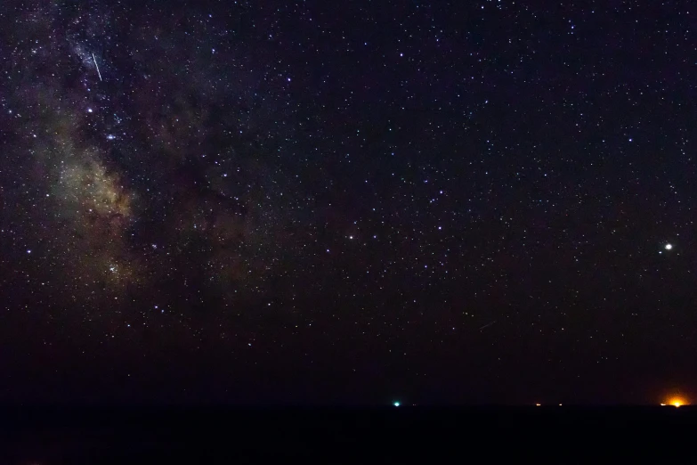 a night sky filled with lots of stars, a picture, pexels, ultra wide horizon, night time footage, low ultrawide shot, long